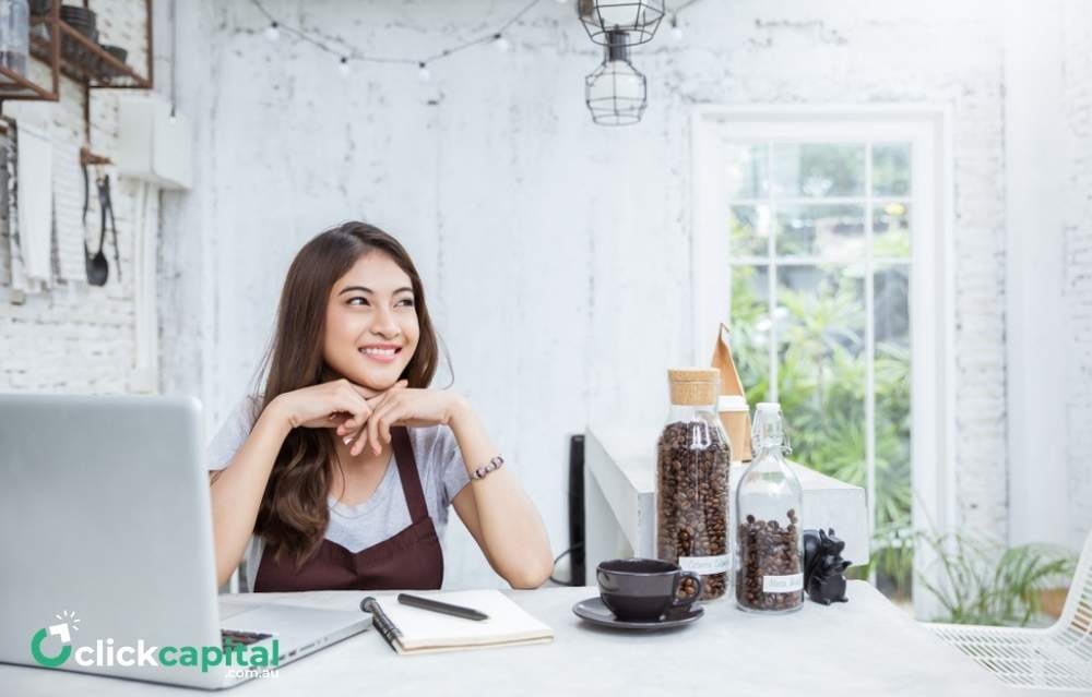 small business owner contemplating on how to grow her business