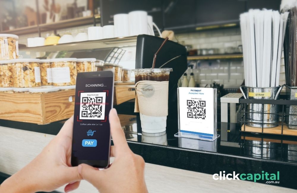 Qr code payment concept. Man scanning tag in Coffee shop.