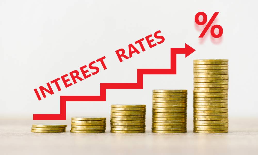 Interest rates concept, stack of coin showing percentage increase graph interest rates rise.